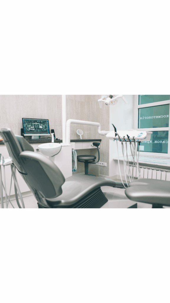Modern dental operatory featuring an ergonomic patient chair, digital X-ray monitor, and advanced equipment, highlighting the **modern comforts and technology** available at Manassra Dental in San Jose.